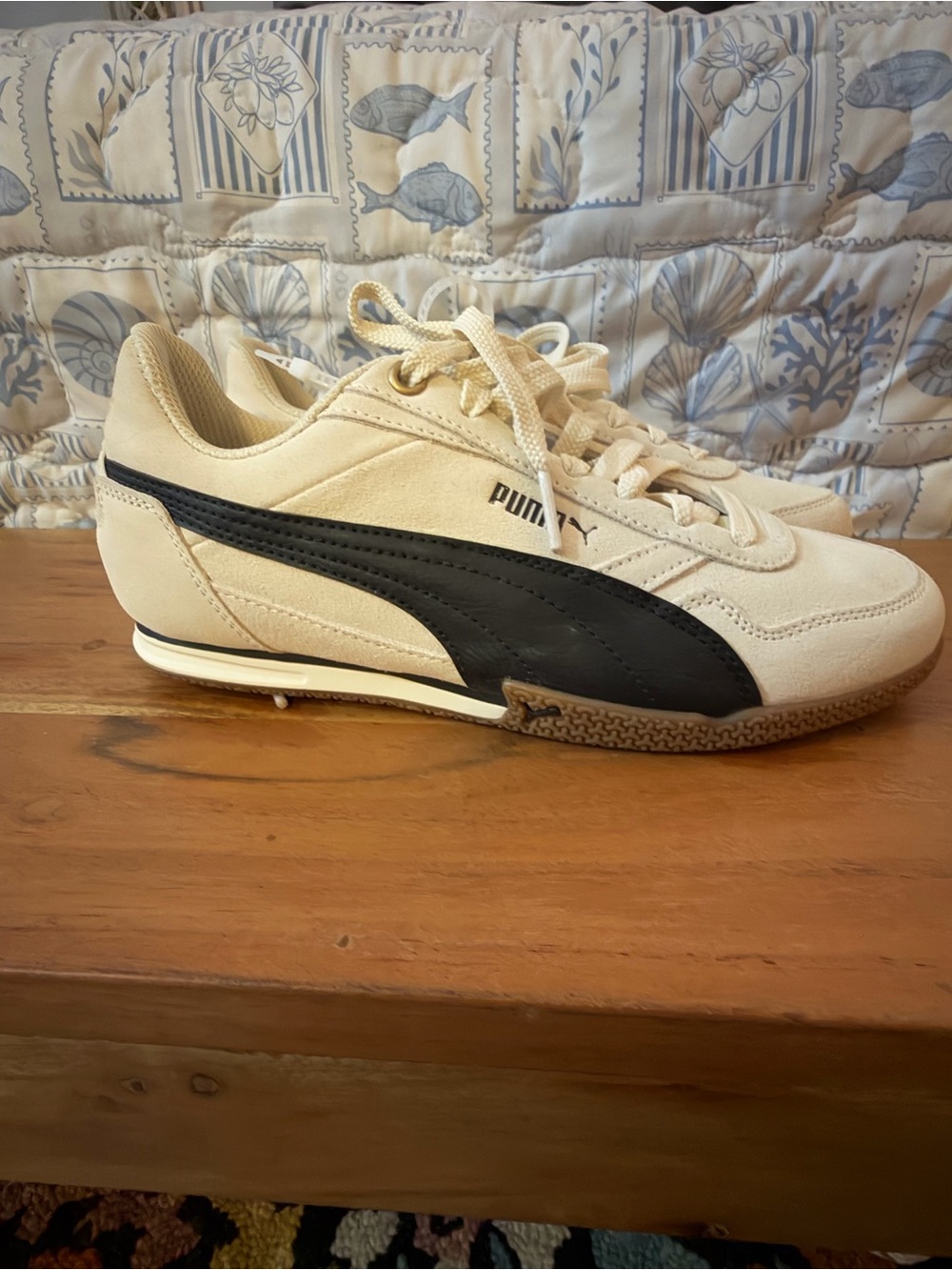 Puma Cream and Black Low-Top Sneakers